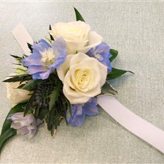 White and blue summer wrist corsage